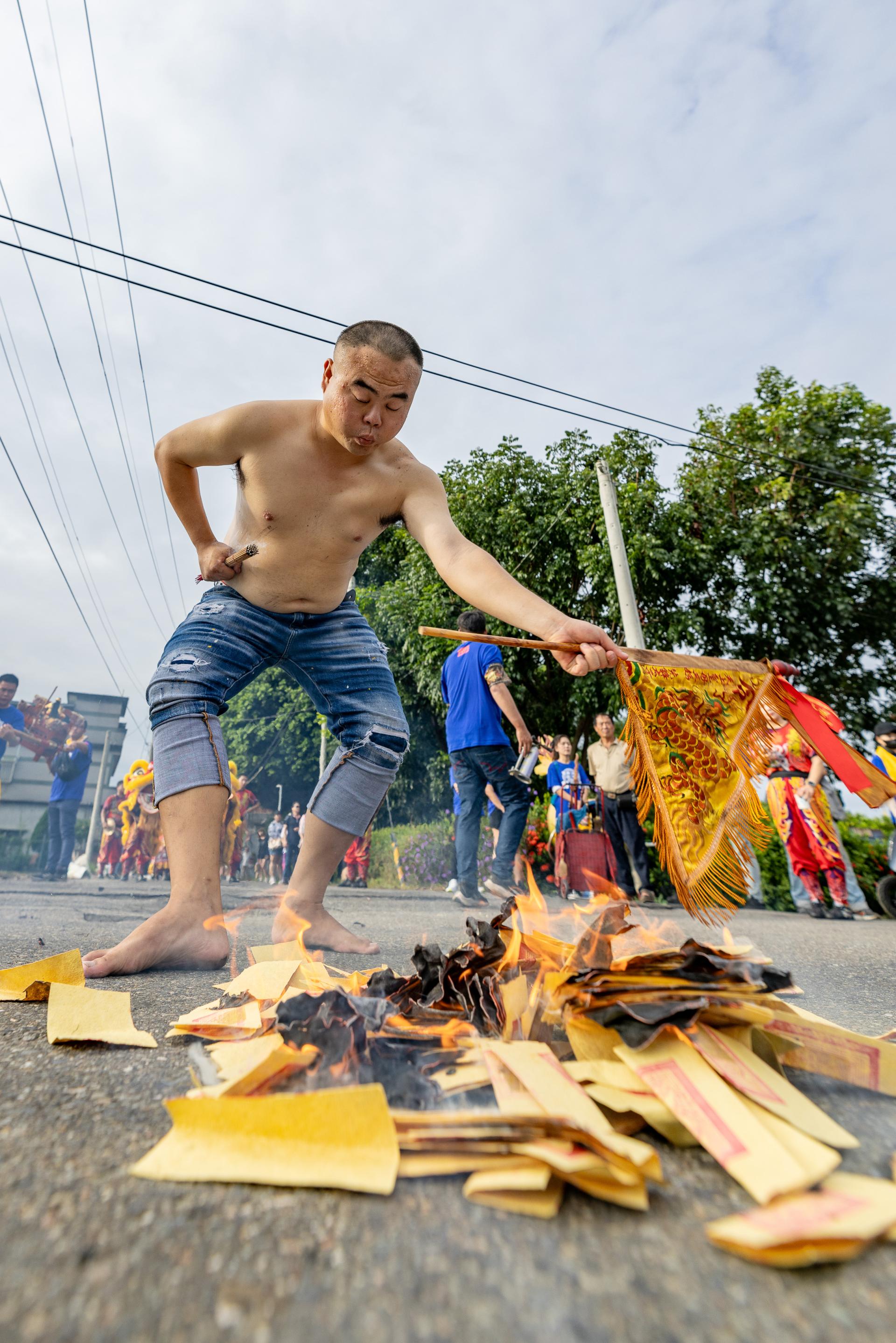 Global Photography Awards Winner - Flames and Flags: A Moment of Spirit Ritual in Taiwanese Fol