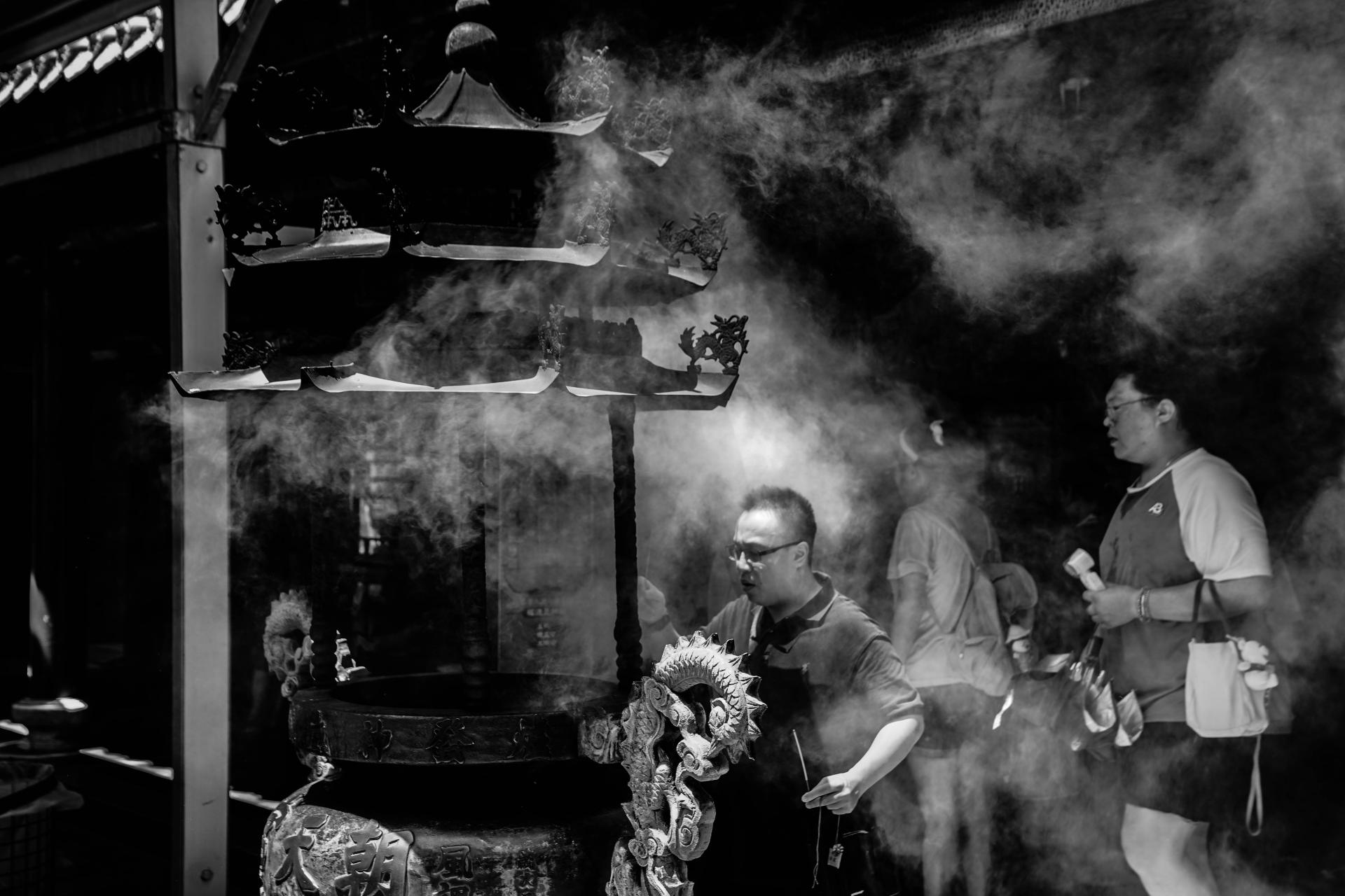 Global Photography Awards Winner - Whispers in the Smoke: Generations of Faith