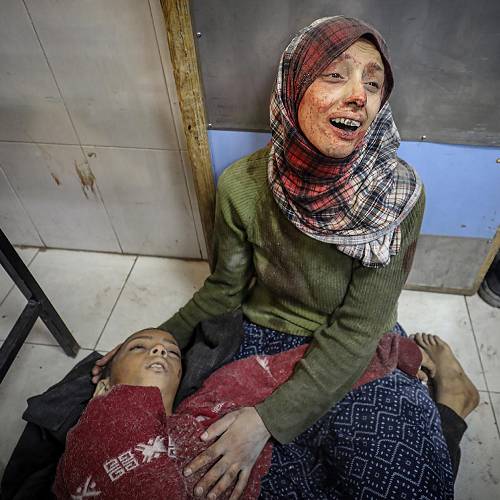 Global Photography Awards Winner - Gaza: The Face of Humanity Under the Weight of Genocide 